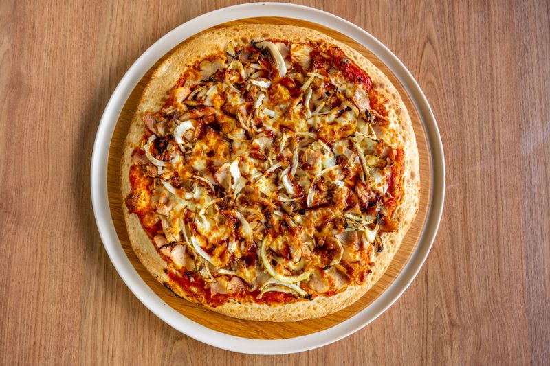 Veggie supreme marcos pizza with colorful vegetables